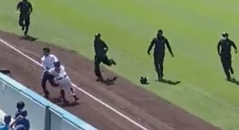 Fan Rushes LA Dodgers’ Game & Gets Taken Out By Ball Girl