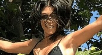 Kourtney Kardashian Shows Off Big In Tiny Black Bikini