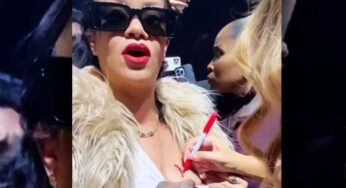 Mariah Carey Signs to Rihanna’s Breast at Christmas Concert